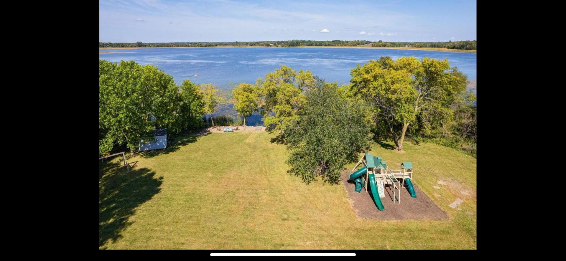 Aerial view of the property and Pickerel Lake shoreline